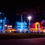 people walking on street during night time